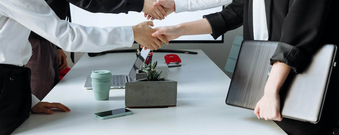 Photo of people shaking hands by Thirdman from Pexels