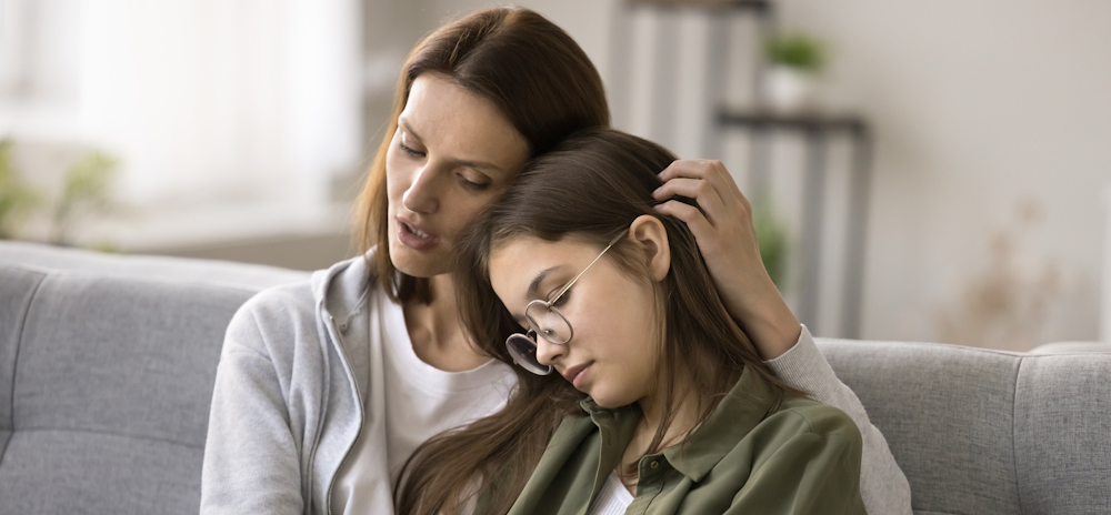 mother comforting child