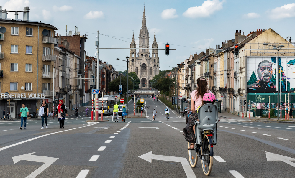 Mother with child on bicycle in Brussels by Werner Leeroy, via Shutterstock