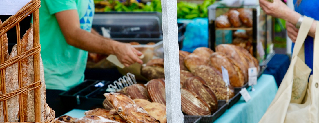 Shopping for bread at a market by David Takisaki