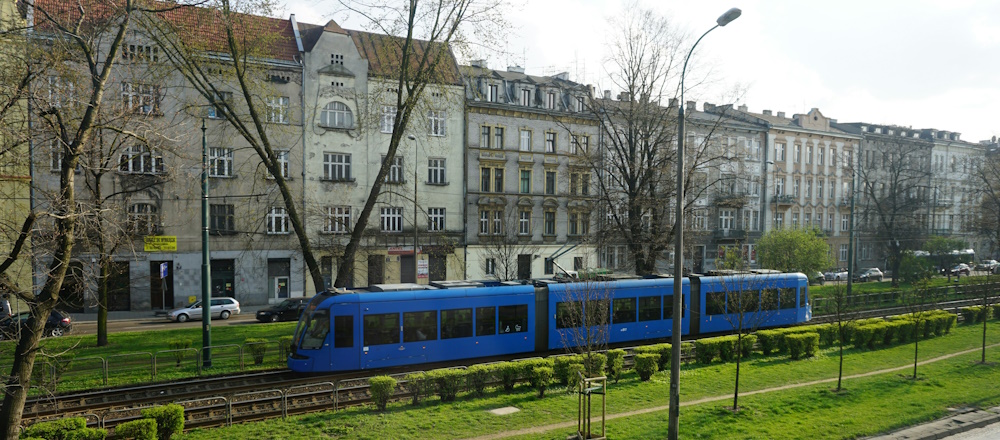 Blue Train in Krakow by Marek Lumi on Unsplash