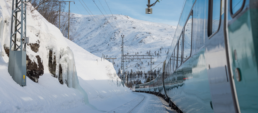Oslo to Bergen train in snowy scene