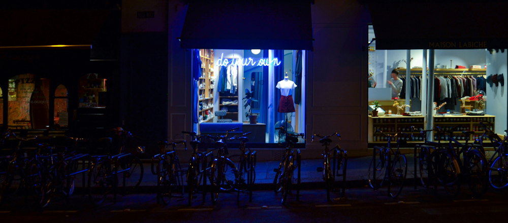 Shops at Night in Paris by Ty Koh on Unsplash