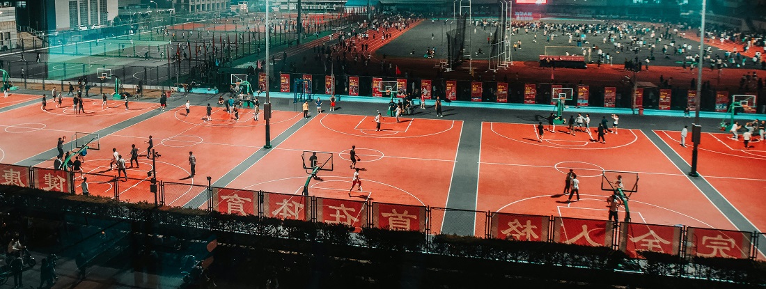 Basketball courts in a Chinese city by Christian Lue