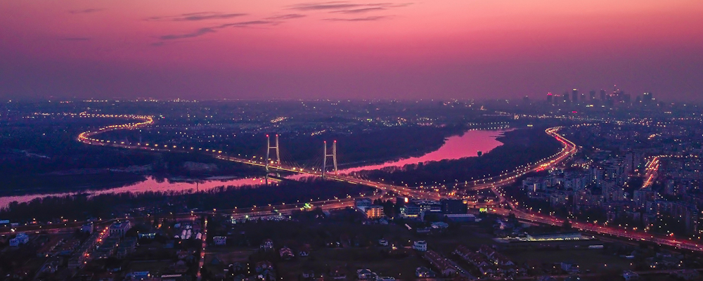 Warsaw Bridge at Twilight by Łukasz Nieścioruk on Unsplash