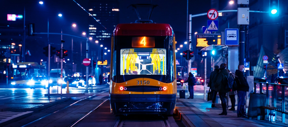 Night Tram in Warsaw by Adam Borkowski on Unsplash