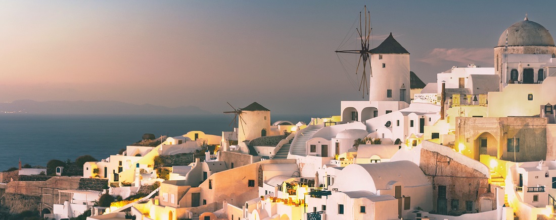 White concrete houses in Santorini by Joel Protasio