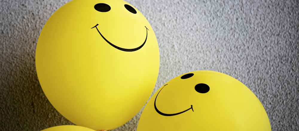 Smiley Balloons by Tim Mossholder on Unsplash
