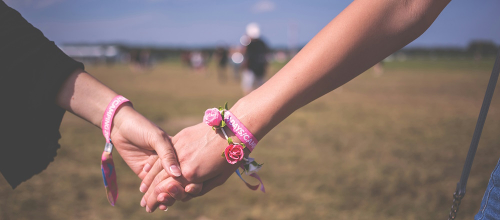 Holding Hands by Freestocks on Unsplash