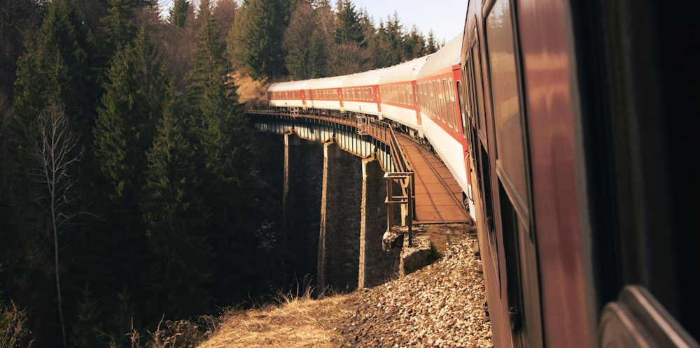 Train on Viaduct in Slovak Mountains by Lukáš Kulla