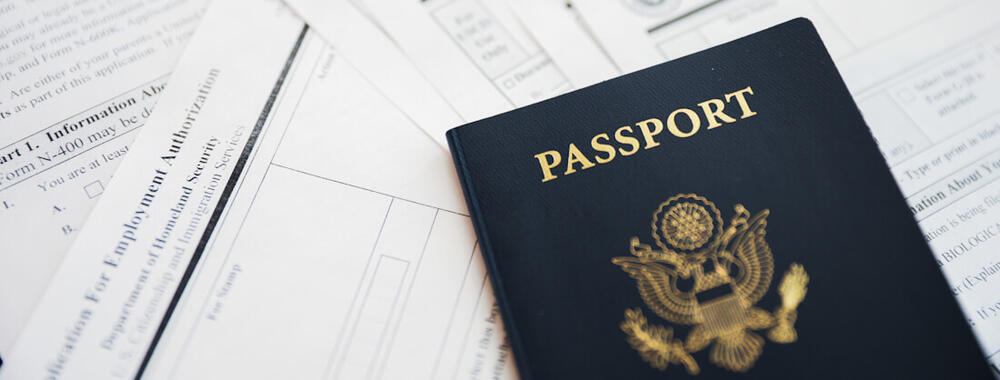 Passport with paperwork